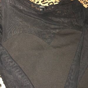 Mesh top black mini dress.